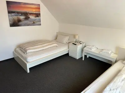 Ein Bett oder Betten in einem Zimmer der Unterkunft Central Apartment Rödermark 3Zimmer