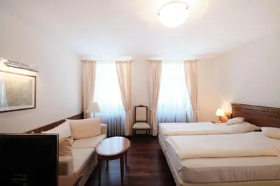 Ein Bett oder Betten in einem Zimmer der Unterkunft Hotel Weisser Bock