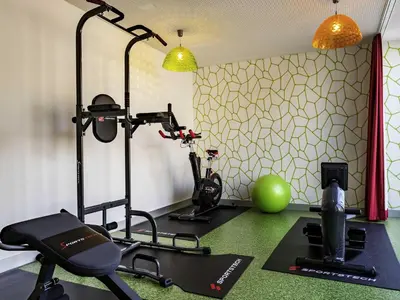 Das Fitnesscenter und/oder die Fitnesseinrichtungen in der Unterkunft ibis Styles Karlsruhe Ettlingen