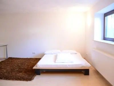 Ein Bett oder Betten in einem Zimmer der Unterkunft LMS Apartments