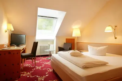 Ein Bett oder Betten in einem Zimmer der Unterkunft Hotel Ochsen