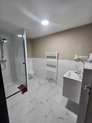 Ein Badezimmer in der Unterkunft Hotel City Faber