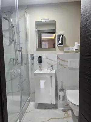 Ein Badezimmer in der Unterkunft Hotel City Faber