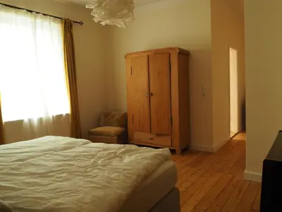 Ein Bett oder Betten in einem Zimmer der Unterkunft Emmas