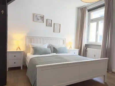 Ein Bett oder Betten in einem Zimmer der Unterkunft Luxury Old Town Suite - XXL Terrasse & XXL Penthouse
