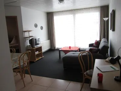 Ein Sitzbereich in der Unterkunft Hotel Waldparkstube