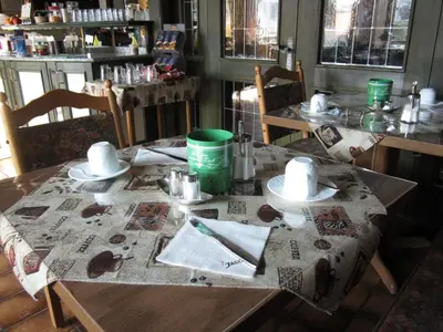 Ein Restaurant oder anderes Speiselokal in der Unterkunft Hotel Waldparkstube
