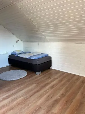 Ein Bett oder Betten in einem Zimmer der Unterkunft Gemütliche Monteur Ferienwohnung