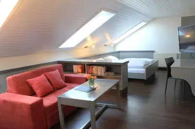 Ein Bett oder Betten in einem Zimmer der Unterkunft Hotel An der Linde