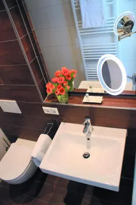 Ein Badezimmer in der Unterkunft Hotel An der Linde