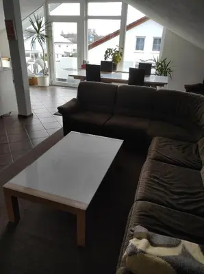 Ein Sitzbereich in der Unterkunft Ferienwohnung Gartenblick
