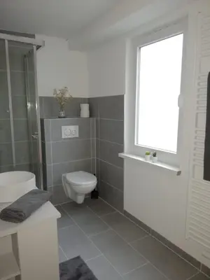 Ein Badezimmer in der Unterkunft Apartement “Heckeresje“