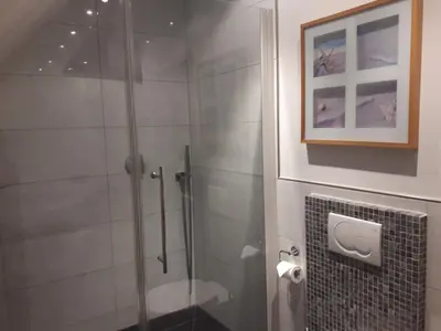 Ein Badezimmer in der Unterkunft GÄSTEHAUS LIFESTYLE