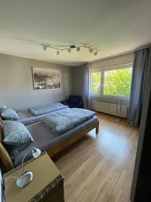Ein Bett oder Betten in einem Zimmer der Unterkunft Ferienwohnung Esmeralda