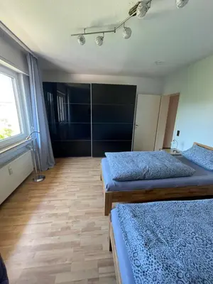 Ein Bett oder Betten in einem Zimmer der Unterkunft Ferienwohnung Esmeralda