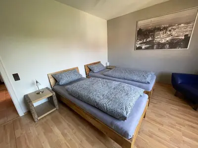 Ein Bett oder Betten in einem Zimmer der Unterkunft Ferienwohnung Esmeralda