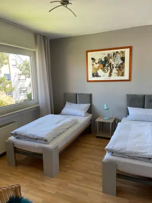 Ein Bett oder Betten in einem Zimmer der Unterkunft Ferienwohnung Esmeralda