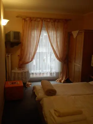 Ein Bett oder Betten in einem Zimmer der Unterkunft Hotel zur Küferschenke