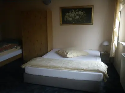 Ein Bett oder Betten in einem Zimmer der Unterkunft Hotel zur Küferschenke
