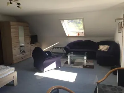Ein Sitzbereich in der Unterkunft Ferienwohnungen Tauscher