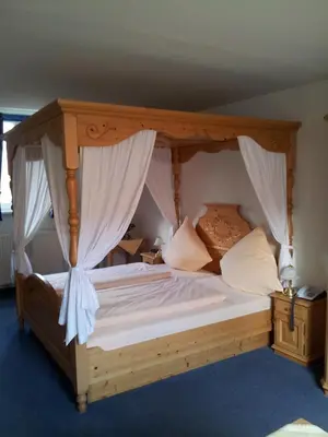Ein Bett oder Betten in einem Zimmer der Unterkunft Hotel Weinheber Hornung