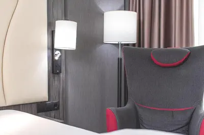 Ein Bett oder Betten in einem Zimmer der Unterkunft PLAZA INN Mannheim