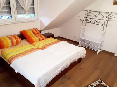 Ein Bett oder Betten in einem Zimmer der Unterkunft Ferienwohnung Farrenkopf