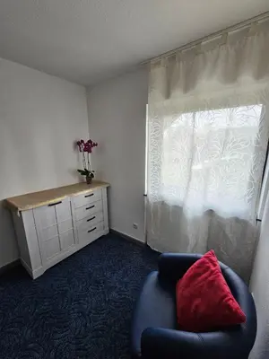 Ein Sitzbereich in der Unterkunft Kompfort Business Apartment