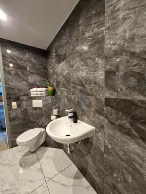 Ein Badezimmer in der Unterkunft Kompfort Business Apartment