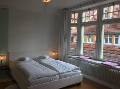 Ein Bett oder Betten in einem Zimmer der Unterkunft Hotel Heidelberg Astoria