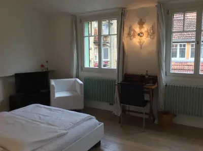 Ein Bett oder Betten in einem Zimmer der Unterkunft Hotel Heidelberg Astoria
