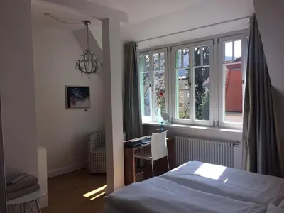 Ein Bett oder Betten in einem Zimmer der Unterkunft Hotel Heidelberg Astoria