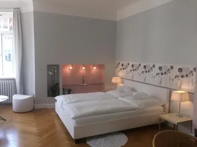 Ein Bett oder Betten in einem Zimmer der Unterkunft Hotel Heidelberg Astoria