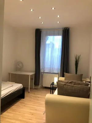 Ein Bett oder Betten in einem Zimmer der Unterkunft Monteurwohnung am Weinberg