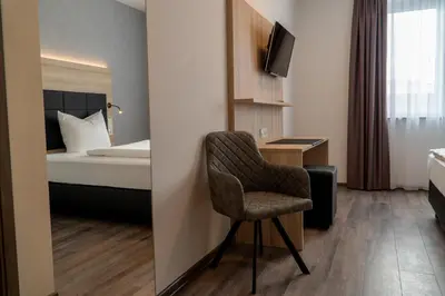 Ein Bett oder Betten in einem Zimmer der Unterkunft Hotel Schlafplatz