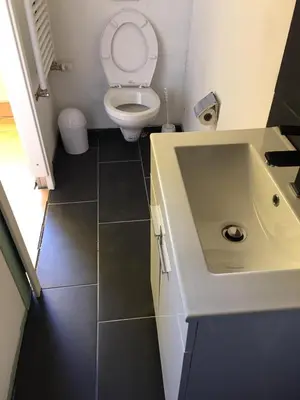 Ein Badezimmer in der Unterkunft Zweibettzimmer