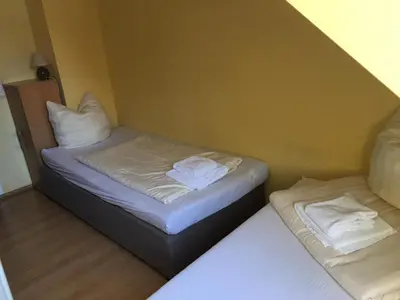 Ein Bett oder Betten in einem Zimmer der Unterkunft Zweibettzimmer