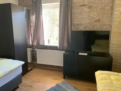 Ein Bett oder Betten in einem Zimmer der Unterkunft Gästehaus Windheim (Ettlingen)