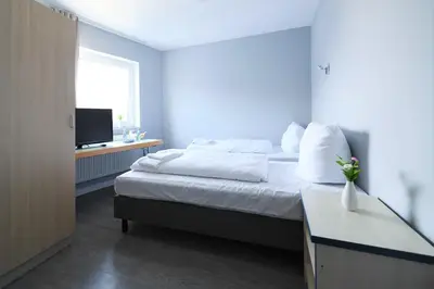 Ein Bett oder Betten in einem Zimmer der Unterkunft Hotel Best one
