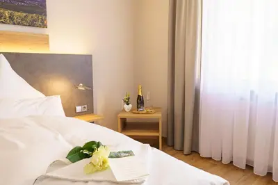Ein Bett oder Betten in einem Zimmer der Unterkunft Pension Bergterrasse