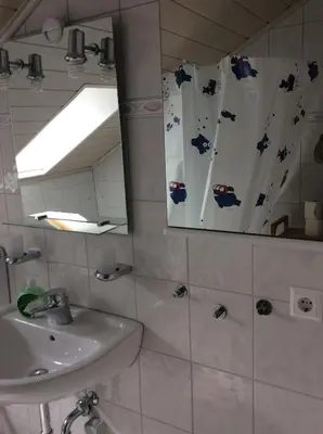 Ein Badezimmer in der Unterkunft Ferienwohnung Heddesheim