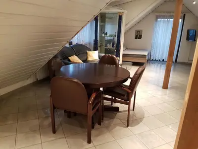 Ein Sitzbereich in der Unterkunft Gino s Ferienwohnung