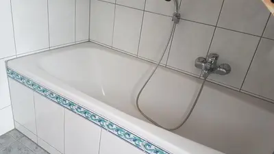 Ein Badezimmer in der Unterkunft Gino s Ferienwohnung