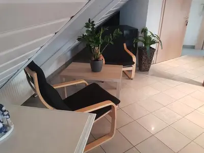 Ein Sitzbereich in der Unterkunft Gino s Ferienwohnung