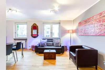 Ein Sitzbereich in der Unterkunft Qube Hotel Bergheim