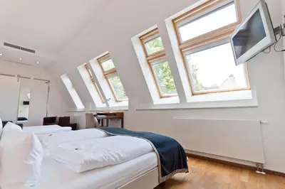 TV/Unterhaltungsangebot in der Unterkunft Qube Hotel Bergheim