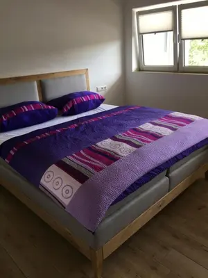 Ein Bett oder Betten in einem Zimmer der Unterkunft Ferienwohnung Reh