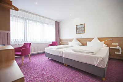 Ein Bett oder Betten in einem Zimmer der Unterkunft Am Bismarck
