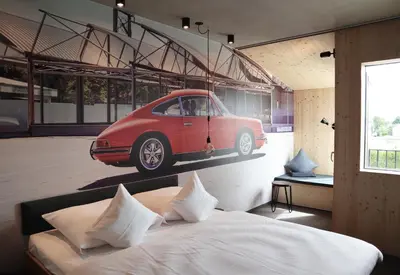 Ein Bett oder Betten in einem Zimmer der Unterkunft elferrooms Hotel