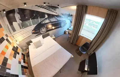 Ein Bett oder Betten in einem Zimmer der Unterkunft elferrooms Hotel